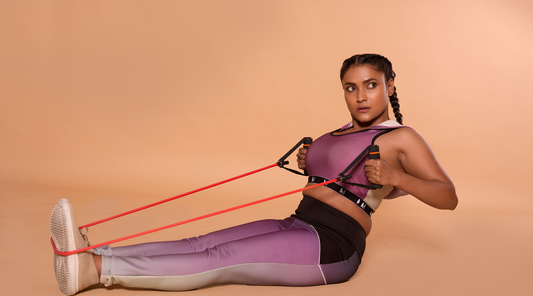 Women performing exercises with resistance bands.