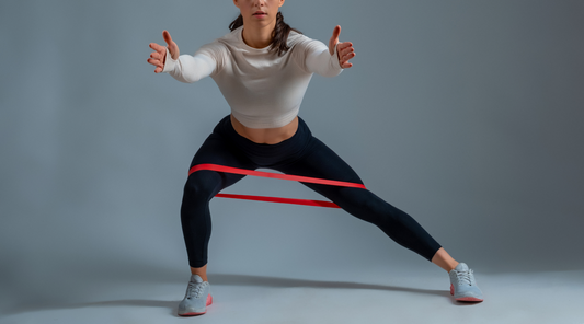 Women performing exercises with mini loop bands.